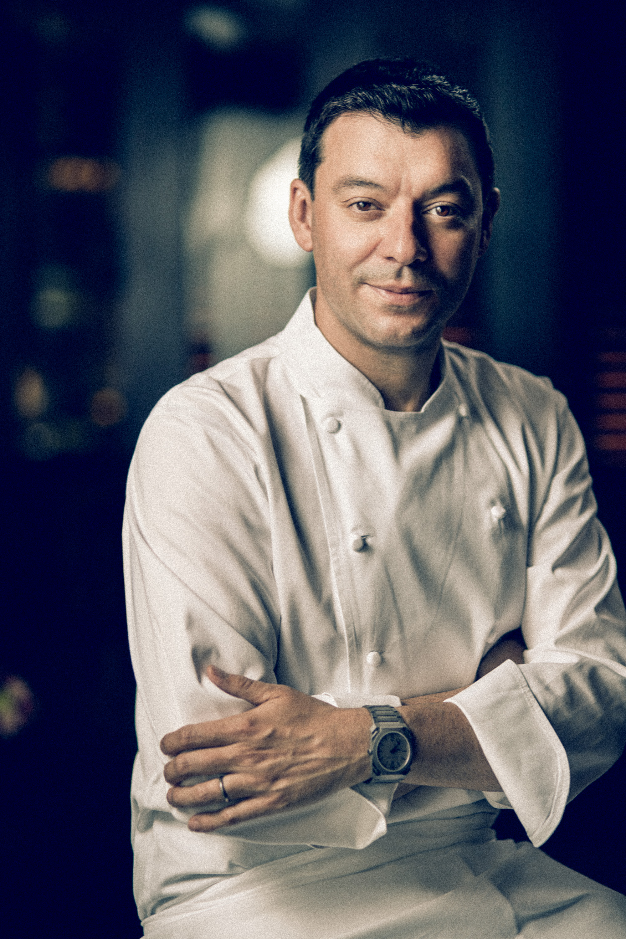 Male chef posing with hands crossed