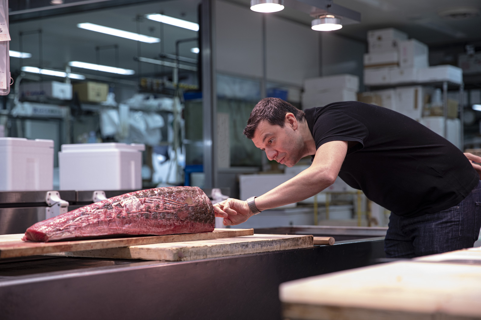 Chef garnishing meat plate