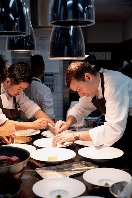 Chef decorating carrots